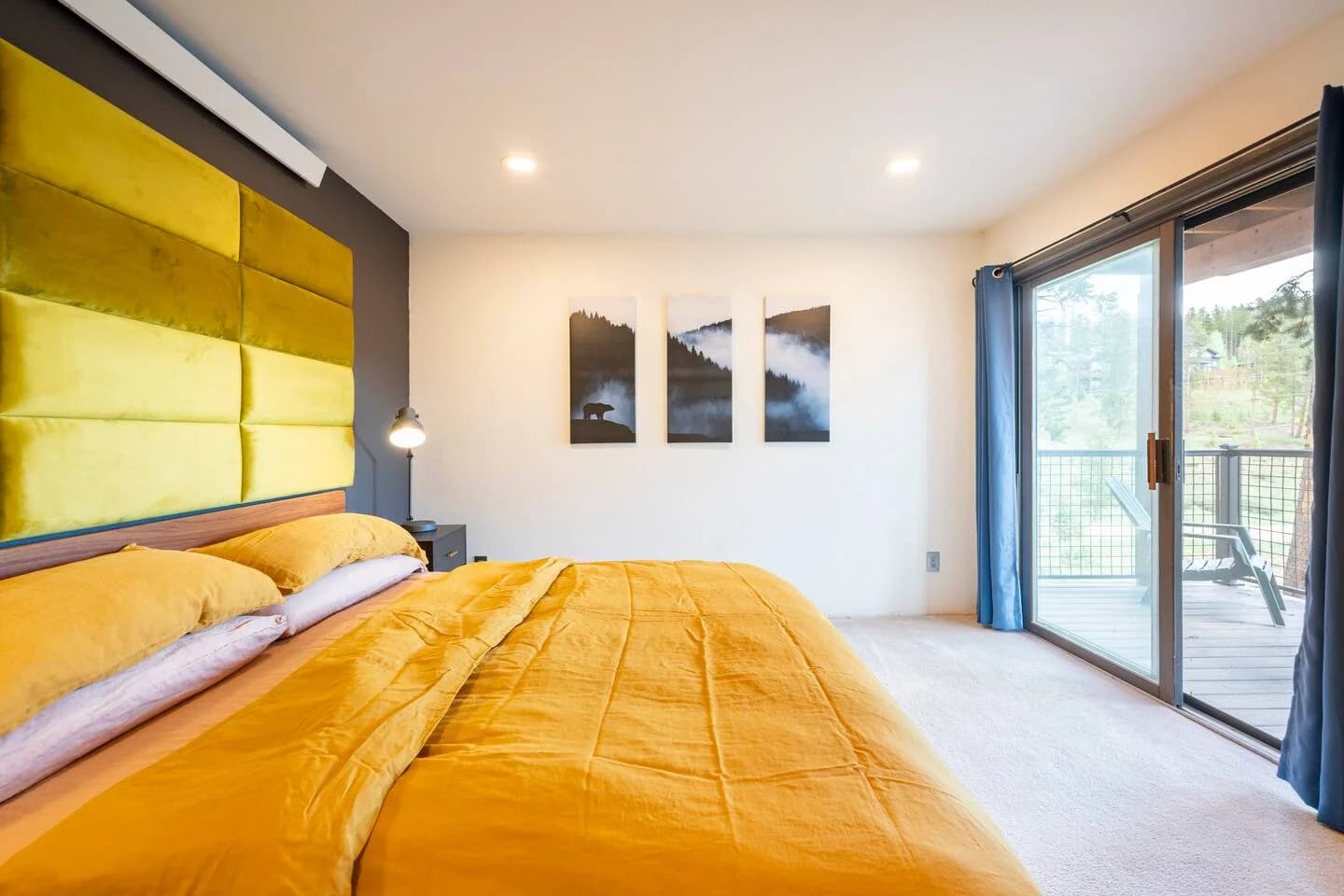 Bedroom with a sliding door out to the deck